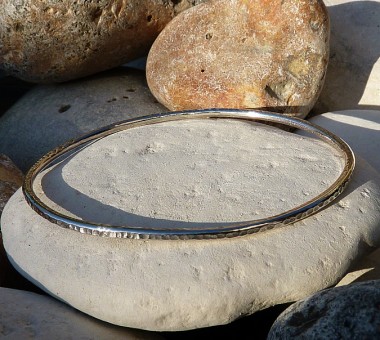 Sterling silver hammered oval bangle
