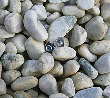 Sterling silver heart earrings with blue topaz